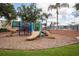 Colorful playground with slides and climbing structures at 2304 Silver Palm Dr # 103, Kissimmee, FL 34747