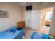 Bedroom showcasing twin beds with themed bedding, a closet, and a mounted TV at 2412 Caravelle Cir, Kissimmee, FL 34746