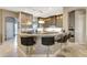 Well-designed kitchen featuring a breakfast bar, modern appliances, and ample counter space at 2442 Heritage Green Ave, Davenport, FL 33837