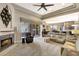 Spacious living room featuring a fireplace, recessed lighting, and sliding glass doors leading to the outdoor area at 2442 Heritage Green Ave, Davenport, FL 33837