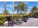 Brick patio with fire pit and golf course views at 2442 Heritage Green Ave, Davenport, FL 33837