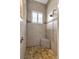 Shower boasts decorative tile, rainfall shower head, and a corner seat at 2442 Heritage Green Ave, Davenport, FL 33837