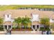 Attractive townhomes feature tile roofs, covered entrances, and well-maintained landscaping at 3185 Pequod Pl, Kissimmee, FL 34746