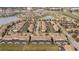 Expansive community of townhomes situated around picturesque ponds and lush green spaces at 3185 Pequod Pl, Kissimmee, FL 34746