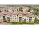 Bird's-eye view showcases the meticulously arranged condos and ample green spaces at 3301 Whitestone Cir # 204, Kissimmee, FL 34741