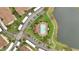 Aerial view features a pool with palm trees, landscaping, and parking at 3301 Whitestone Cir # 204, Kissimmee, FL 34741