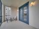 Cozy balcony featuring seating and a view of the community at 3301 Whitestone Cir # 204, Kissimmee, FL 34741