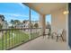 Balcony overlooking a courtyard with beautiful seating at 3301 Whitestone Cir # 204, Kissimmee, FL 34741