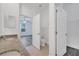 Bathroom with granite vanity and doorway to the toilet and closet at 3301 Whitestone Cir # 204, Kissimmee, FL 34741