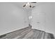 Spacious bedroom features wood-look floors, white walls and ceilings, and a double closet at 3301 Whitestone Cir # 204, Kissimmee, FL 34741