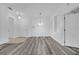 Living room featuring vinyl flooring and white walls at 3301 Whitestone Cir # 204, Kissimmee, FL 34741