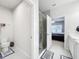Bathroom featuring a sleek shower stall and access to the Primary bedroom at 3493 Lazy River Ter, Sanford, FL 32771