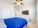 Cozy bedroom with ceiling fan and carpeted floor at 3493 Lazy River Ter, Sanford, FL 32771