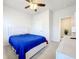 Bright bedroom featuring a ceiling fan, carpeted floor, and ample natural light at 3493 Lazy River Ter, Sanford, FL 32771