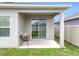 View from covered patio overlooking green lawn, providing great outdoor space at 3493 Lazy River Ter, Sanford, FL 32771
