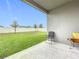 View from covered patio overlooking fenced backyard, creating great space to relax at 3493 Lazy River Ter, Sanford, FL 32771