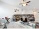 Comfortable living room with a large sectional sofa and contemporary decor at 3493 Lazy River Ter, Sanford, FL 32771