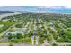 Aerial view of the property, highlighting its location near Flagler Ave and lush surroundings at 350 E 2Nd Ave, New Smyrna Beach, FL 32169