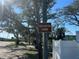 Callalisa Park sign under trees on a sunny day at 350 E 2Nd Ave, New Smyrna Beach, FL 32169