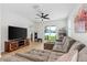 Inviting living room featuring a large sectional sofa, and modern decor at 350 E 2Nd Ave, New Smyrna Beach, FL 32169