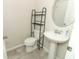 Charming half-bath with pedestal sink and stylish fixtures, perfect for guests and convenience at 3557 Brighton Park Cir, Orlando, FL 32812