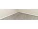 Carpeted bedroom with neutral walls, white trim, and natural light at 3557 Brighton Park Cir, Orlando, FL 32812