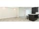 Open concept living area with kitchen, dining area and slider, and recessed lights at 3557 Brighton Park Cir, Orlando, FL 32812