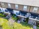 Aerial view of fenced back patios with outdoor seating and air conditioning units at 385 Cape Honeysuckle Pl, Sanford, FL 32771