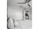 Neutral bedroom with a ceiling fan, closet and connected room with tv at 385 Cape Honeysuckle Pl, Sanford, FL 32771