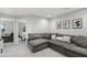 Cozy seating area with comfortable couch and scenic views in the background at 385 Cape Honeysuckle Pl, Sanford, FL 32771