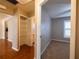 View of the bedroom showing carpet floors and bathroom in the background at 385 Eron Way # 45, Winter Garden, FL 34787