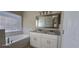 Bathroom with a large tub and double sink vanity at 4151 Forest Island Dr, Orlando, FL 32826