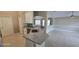 Open concept kitchen with granite countertops and tile flooring at 4151 Forest Island Dr, Orlando, FL 32826