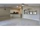Spacious living room with open kitchen and tile flooring at 4151 Forest Island Dr, Orlando, FL 32826
