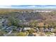 An elevated shot of the home highlighting the surrounding lush greenery at 4251 King Edward Dr, Orlando, FL 32826