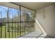 Screened balcony with peaceful views of landscaped surroundings at 4300 Hector Ct # 7, Orlando, FL 32822