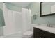 Bathroom with a shower-tub combo, single sink vanity, and a neutral color scheme at 4300 Hector Ct # 7, Orlando, FL 32822