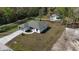 An aerial view of a single-Gathering home with a large yard in a peaceful, wooded neighborhood at 4470 Frances Ave, Sanford, FL 32773