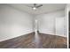 Light filled bedroom with wood-look floors and ceiling fan at 4470 Frances Ave, Sanford, FL 32773