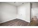 A bright bedroom with wood floors and a closet at 4470 Frances Ave, Sanford, FL 32773