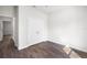 Bedroom with wood-look floors and a double door closet at 4470 Frances Ave, Sanford, FL 32773