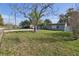 A well-manicured lawn enhances the curb appeal of this charming home at 5454 San Juan Blvd, Orlando, FL 32807