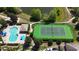 Aerial view of community tennis court and pool at 619 Blenheim Loop, Winter Springs, FL 32708