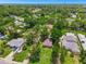 Aerial view of home showcasing the lush surroundings and neighborhood layout, close to town at 651 W Lake Brantley Rd, Altamonte Springs, FL 32714