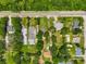 Aerial view shows the home and neighborhood with mature trees and proximity to the main road at 651 W Lake Brantley Rd, Altamonte Springs, FL 32714