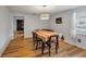 Bright dining room features wood floors, natural light, and a decorative light fixture at 651 W Lake Brantley Rd, Altamonte Springs, FL 32714