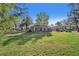 Brick home situated on a large grassy lot with mature trees at 651 W Lake Brantley Rd, Altamonte Springs, FL 32714
