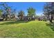 Well-kept single-story brick home set on a lush green lawn, perfect for outdoor enjoyment at 651 W Lake Brantley Rd, Altamonte Springs, FL 32714