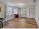 Airy living room with wood-look flooring and natural light at 651 W Lake Brantley Rd, Altamonte Springs, FL 32714