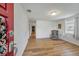 Bright, spacious living room with stylish wood-look flooring, and a welcoming atmosphere at 651 W Lake Brantley Rd, Altamonte Springs, FL 32714